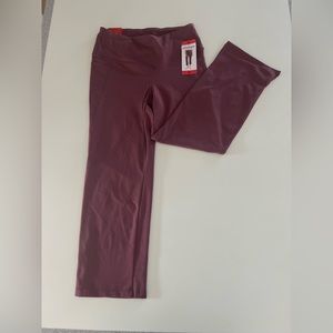 Jockey cropped slit flare elastic pants